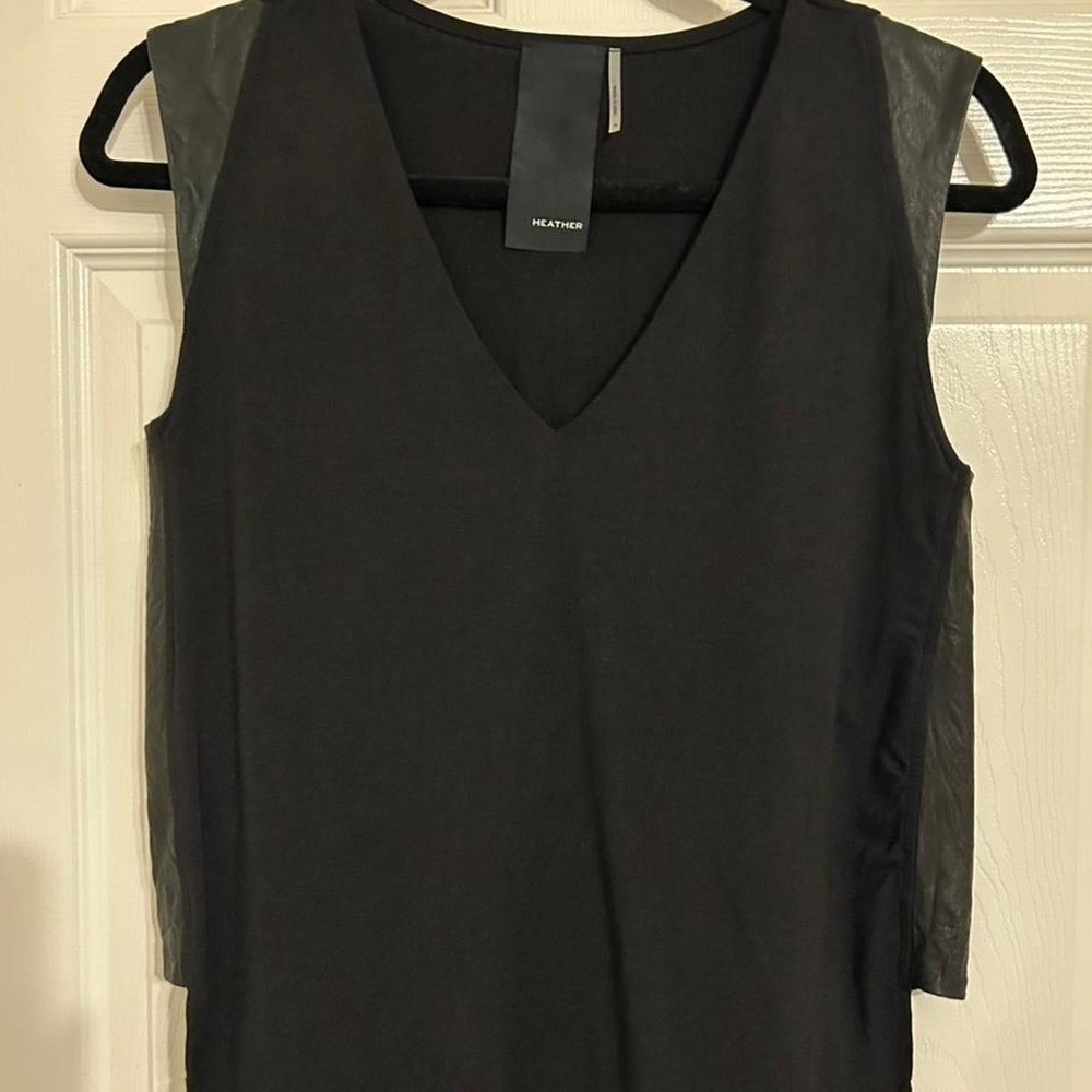 Black sleeveless top with leatherβ accent